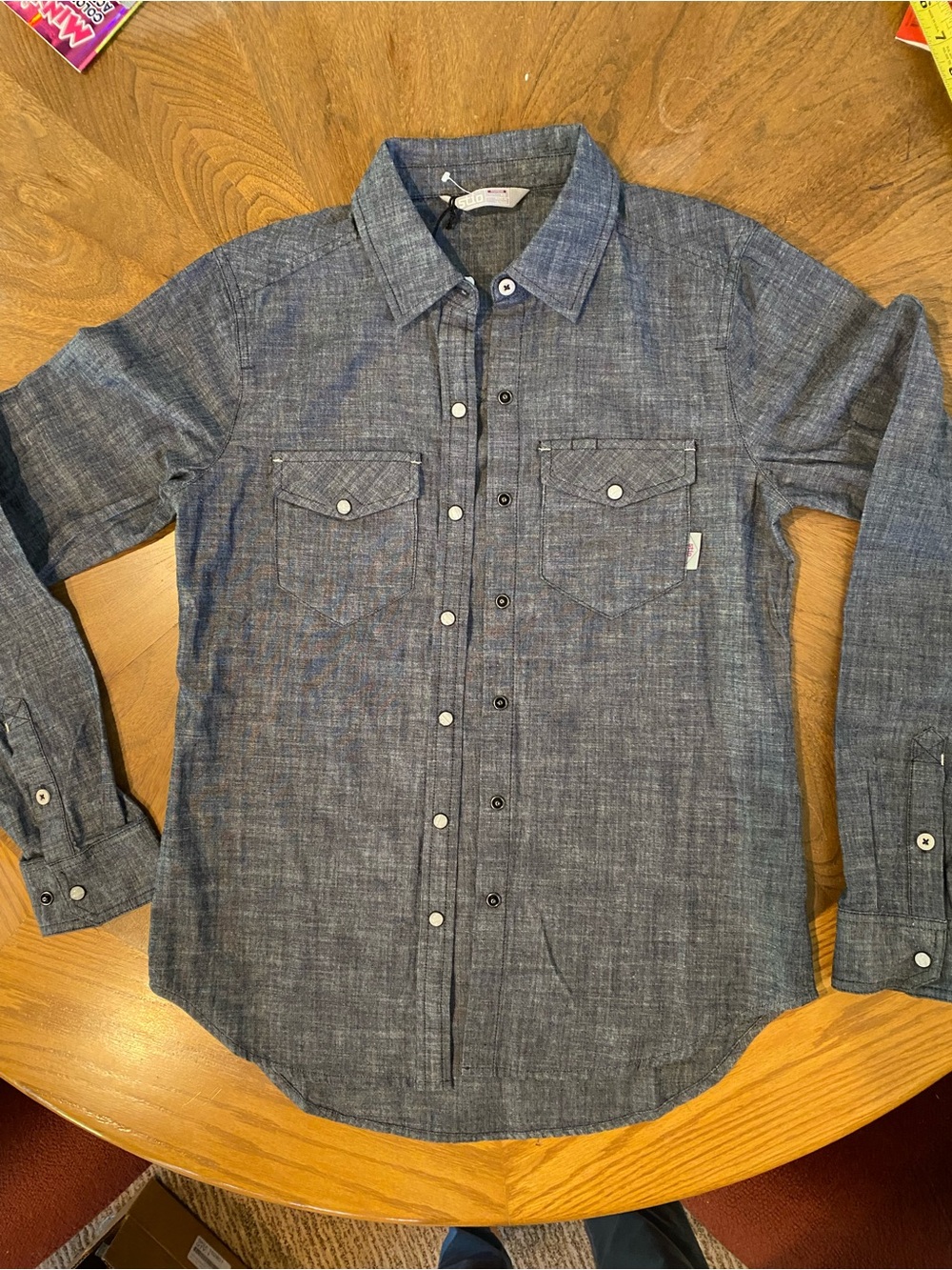 Stio Women’s Long-Sleeve Chambray Shirt dark blue.
